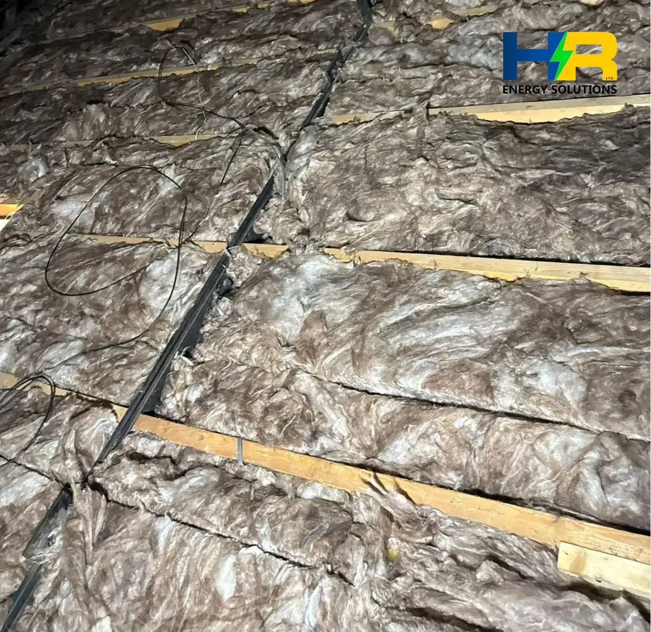 Loft insulation being installed