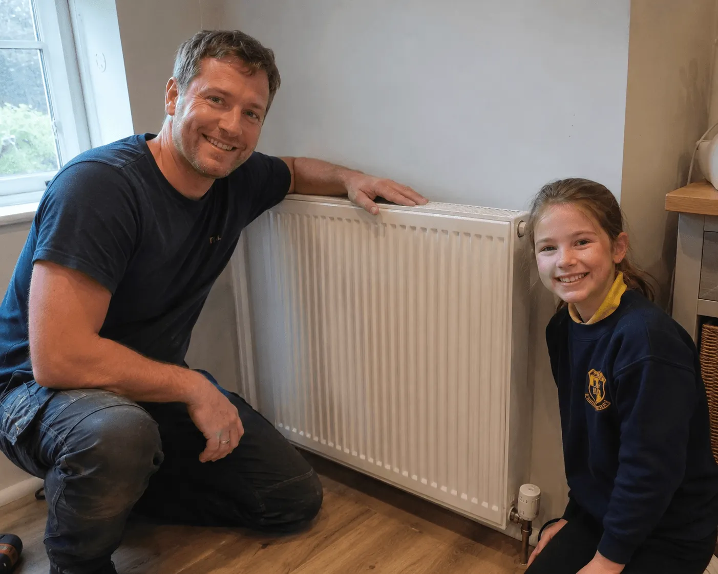 Happy family enjoying their new boiler heating